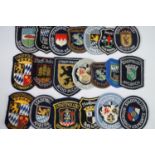 A quantity of German Police / Deutsche Polizei embroidered unit badges