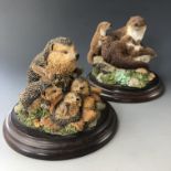 Royal Doulton figurines of an otter and a hedgehog