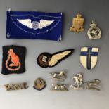 Sundry military insignia including an RAF Flight Engineer's brevet