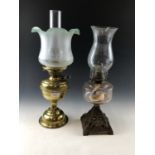 Two Victorian oil lamps, one having etched glass shade