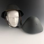 Two post-War German Volkspolizei helmets