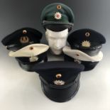 A quantity of post-War German Bremen / Bremerhaven Police / Deutsche Polizei caps