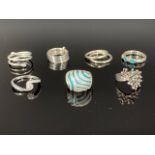 Contemporary white metal (tests as silver) rings, including a turquoise and cubic zirconia