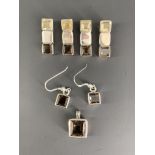 A quantity of contemporary smoky quartz, citrine and white metal (tests as silver) jewellery, of