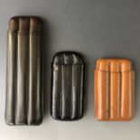 Three hide cigar cases