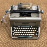 An Underwood Golden Touch typewriter, circa 1960s