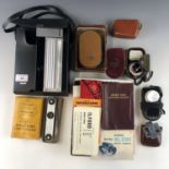 A quantity vintage camera / photography equipment and documents including a Bell & Howell 6" f 4.5