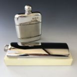 A contemporary pewter hip flask with Celtic interlaced decorative bands, together with a polished