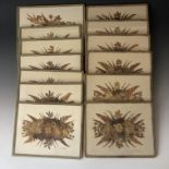 Two sets of 1930s table / place mats hand-crafted with pressed flowers, pencil signed 'M. McDean'