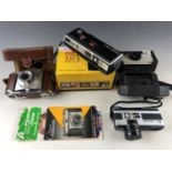 Kodak Instamatic 28 and M14, Retinette, Fujica 350 Zoom and Minolta Pocket Autopak 450 Ex cameras
