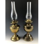 Two brass oil lamps