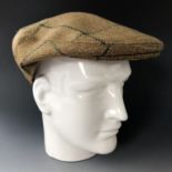 A John Dickson and Son brown / green tweed cap, size 7 1/4