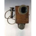A 1920's wall mounting telephone