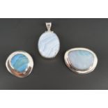 Three contemporary white metal (tests as silver) and gemstone / hardstone pendants, 29.6g