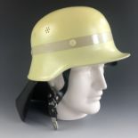 A post-War German fire fighter's helmet