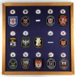 A mounted display of post-War German Police / Deutsche Polizei badges