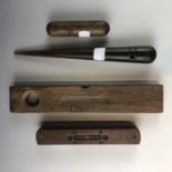 Three early 20th Century spirit levels and a hardwood fid, 22 cm