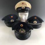 A quantity of post-War German Neidersachsen Police / Deutsche Polizei caps
