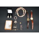 Vintage costume jewellery and wristwatches, including a white metal (tests as silver) zodiacal