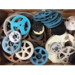 A quantity of vintage projector film reel cores