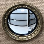 An old reproduction Regency circular gilt-framed convex mirror, 50 cm