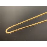 A yellow-metal fine curb-link neck chain, tests as gold, 5.2g