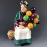 A Royal Doulton figurine 'The Old Balloon Seller', HN 1315, 20 cm