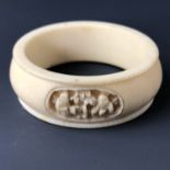 An early 20th Century Canton / Chinese carved Ivory napkin ring