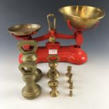 A set of Libra kitchen scales and nine bell weights