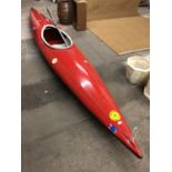 A vintage Ottersports fibreglass canoe, circa 1970s-1980s