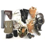 A quantity of post-War German Police / Deutsche Polizei holster, belts and accoutrements
