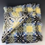 A vintage and traditional Welsh wool "tapestry" blanket, woven in tones of lemon yellow and blue, c.