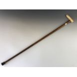 A Victorian Malacca walking cane with ivory handle and rolled-gold ferrule, 93 cm