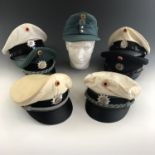 A quantity of post-War German Schleswig-Holstein / Hamburg Police / Deutsche Polizei caps