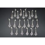 Eleven pairs of 'new old stock' white metal (tests as silver) marcasite and amethyst ear pendants,