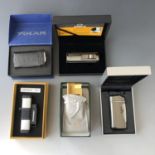 Five various gas cigar lighters in original packaging, as new