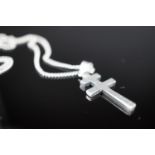 A white metal (tests as silver) patriarchal cruciform pendant on chain, 6.9 g