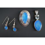 Contemporary white metal (tests as silver) and blue labradorite jewellery, including two pendants