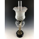 A Victorian brass-columnar oil lamp