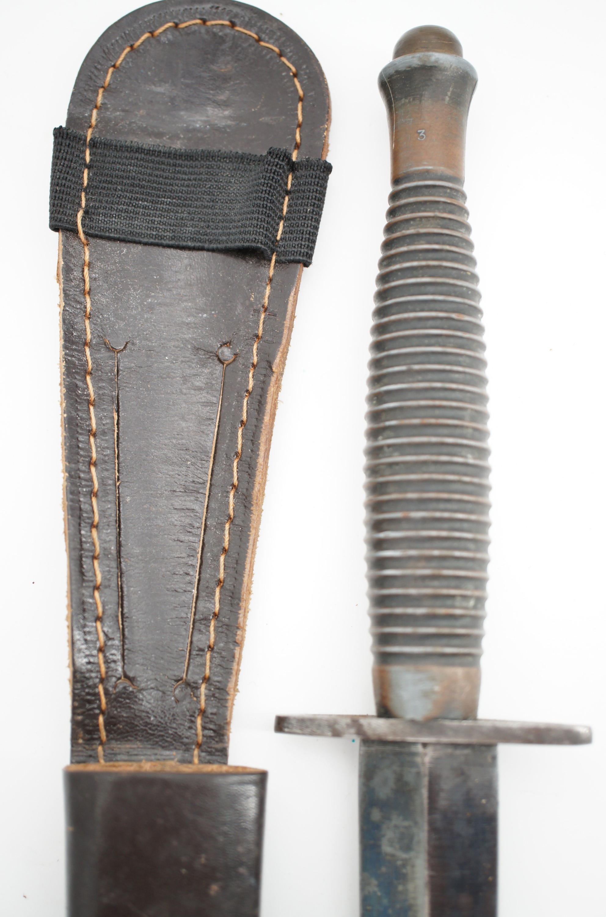 A Fairbairn Sykes / FS third pattern fighting knife, the grip bearing mould mark 3 - Image 5 of 6