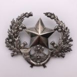 A Cameronians silver cap badge, Gaunt, Birmingham, 1917