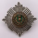 A Royal Scots silver and enamel cap badge, JWB&Co, London, 1910, 48 mm