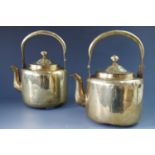 Two late Meiji Japanese brass teapots / kettles, bearing in Japanese characters the manufacturer's