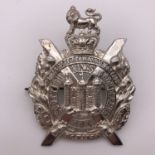 A King's Own Scottish Borderers silver cap badge, J R Gaunt, Edinburgh, 1973-4