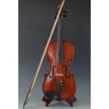 A 19th Century violin, bearing an internal paper label inscribed in ink "T [?] Dodds, Waterhead,