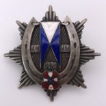 A Polish 19th Wolynski Lancers Regiment of General Rozycki enamelled breast badge