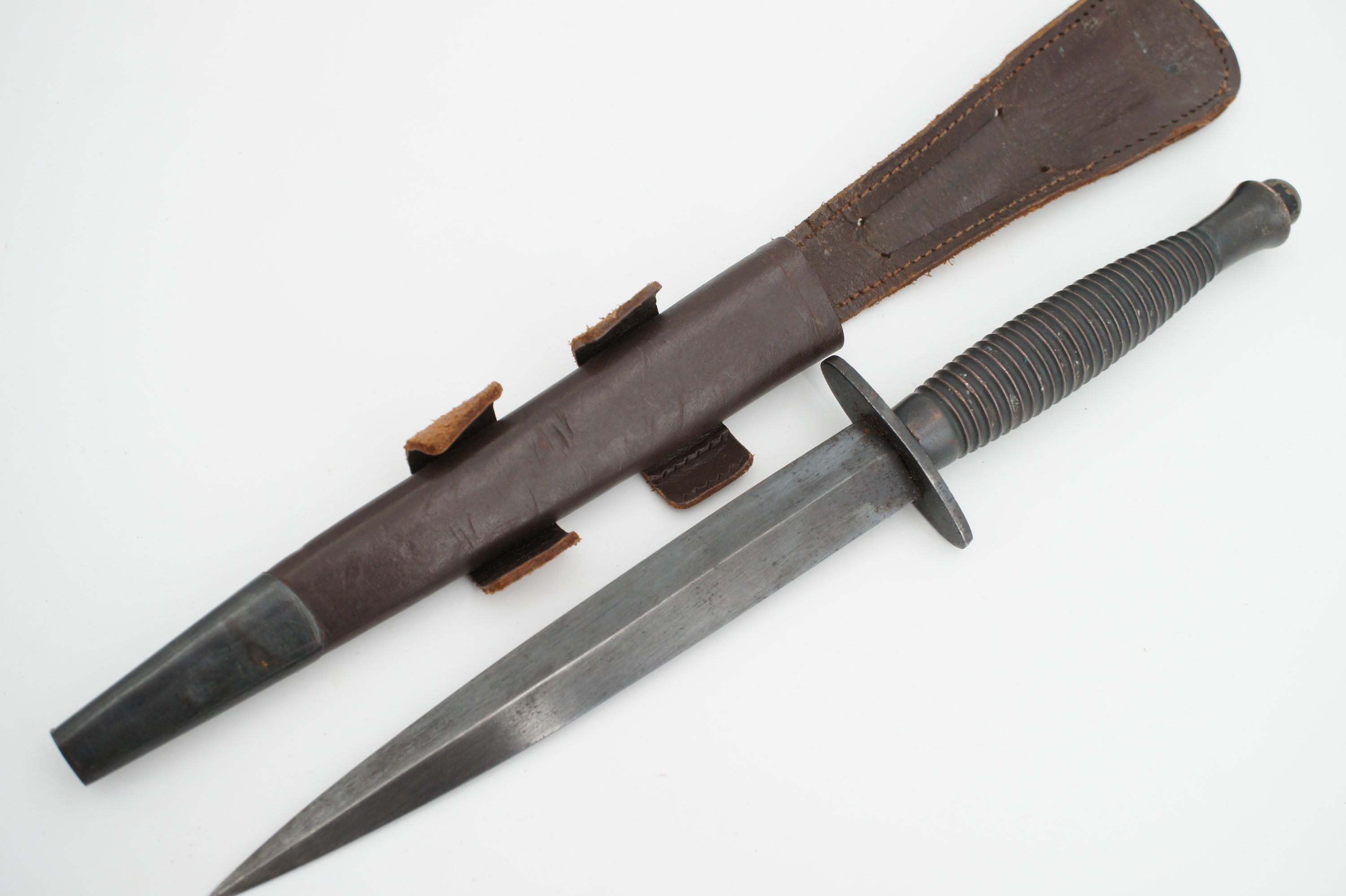 A Fairbairn Sykes / FS third pattern fighting knife, the grip bearing mould mark 3