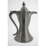 A Victorian Britannia metal communion wine jug, 30 cm