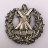 A Victorian 79th (Queen's Own Cameron Highlanders) bonnet / cap badge