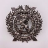A London Scottish silver cap badge, of heavy multi-piece construction, marks partially cancelled